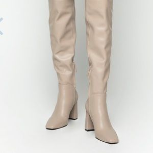 Tall legged heel boot